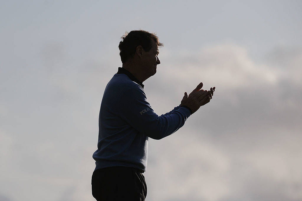 Tom Watson applauds Stewart Cink following the play-off in The 138th Open